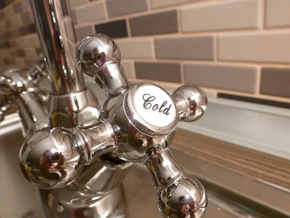 Chrome faucet with running water