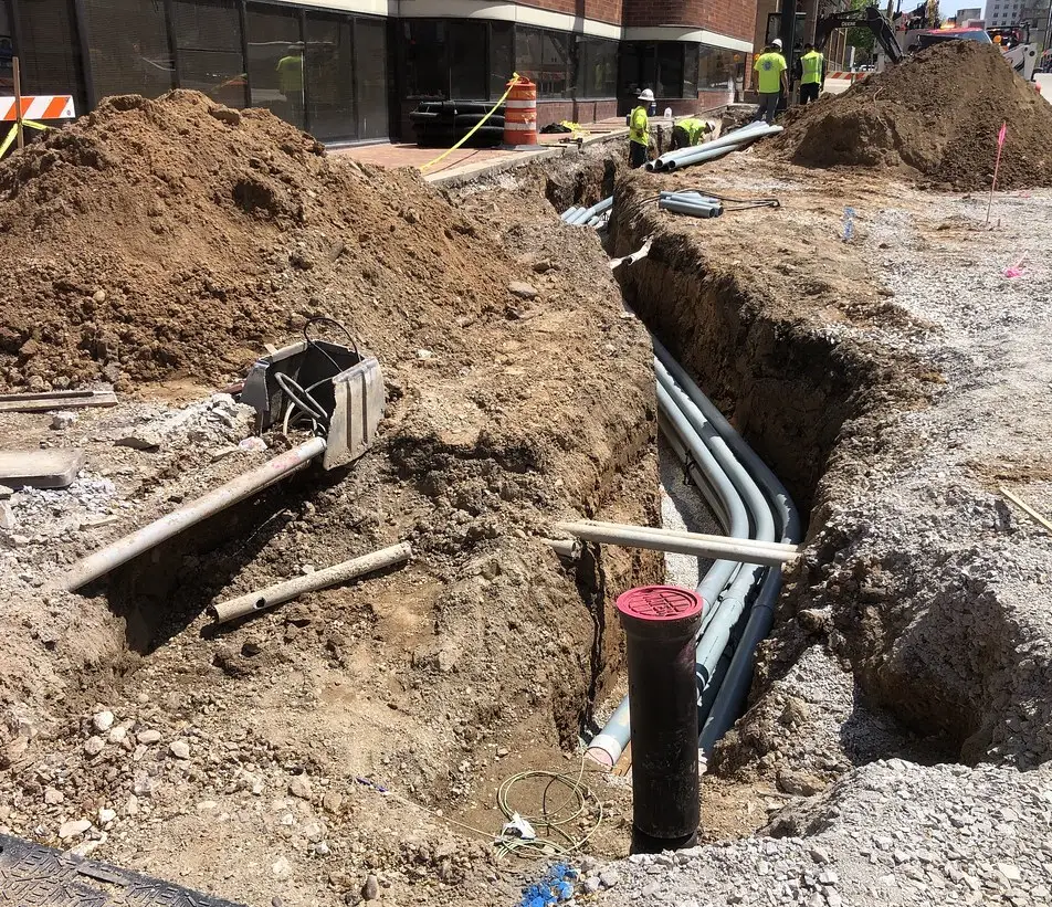 Water line work at the street — trench and mains